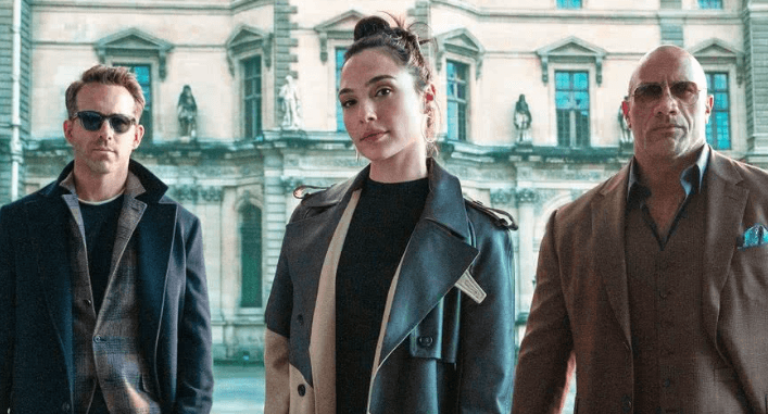 Dwayne Johnson, Gal Gadot e Ryan Reynolds em Alerta Vermelho